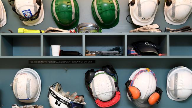 Workers helmets and safety equipment on display at the Qenos Altona plant in Melbourne, Monday, August 28, 2017. Earlier the Federal Opposition Leader Bill Shorten joined local Labor members, Joanne Ryan and Tim Watts on a tour at Qenos Altona Gas plant. (AAP Image/Joe Castro) NO ARCHIVING