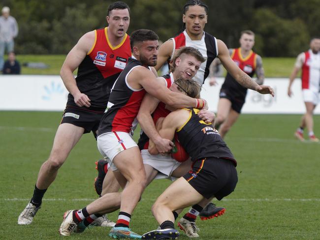 SFL: St Kilda City’s Troy Kelm in a strong tackle. Picture: Valeriu Campan