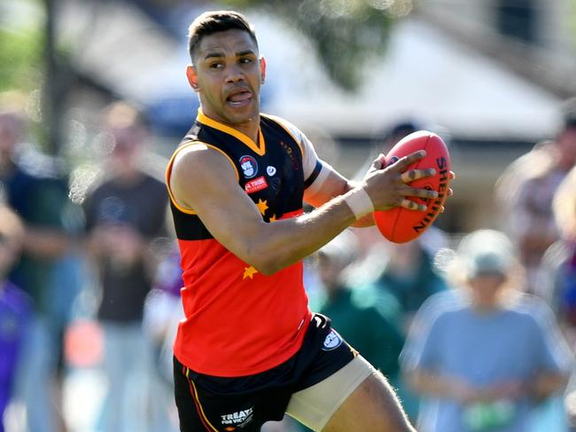 Neville Jetta of the Fitzroy Stars runs with the ball during the 2024 Northern Football Netball League Division 3 Heidelberg Golf Club Seniors Grand Final match between the Fitzroy Stars and the Old Paradians at Lalor Reserve, on September 07, 2024, in Melbourne, Australia. (Photo by Josh Chadwick)