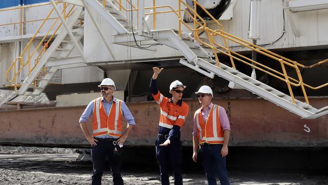 Opposition energy spokesman Chris Bowen and Labor senator Anthony Chisholm with a BHP worker at the Gregory Crinum coal mine in Queensland. Picture: Supplied