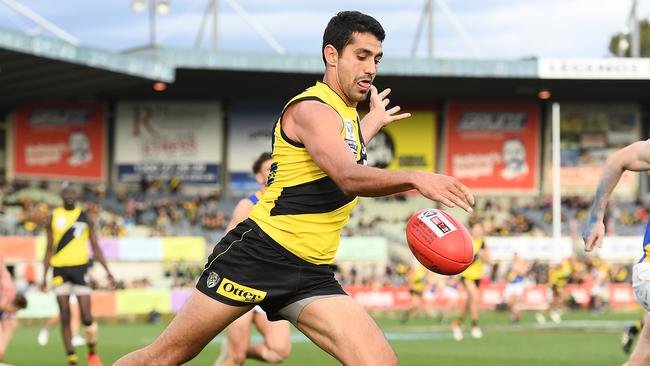 Marlion Pickett thrusts Richmond forward during Sunday’s VFL grand final. Picture: Quinn Rooney/Getty Images.