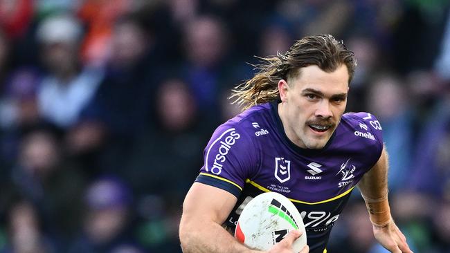 MELBOURNE, AUSTRALIA - SEPTEMBER 14:  Ryan Papenhuyzen of the Storm runs the ball during the NRL Qualifying Final match between Melbourne Storm and Cronulla Sharks at AAMI Park on September 14, 2024 in Melbourne, Australia. (Photo by Quinn Rooney/Getty Images)