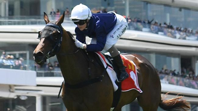 MELBOURNE, AUSTRALIA - NOVEMBER 07: Jamie Kah riding The Map winning Race 5, the The Macca's Run, during Melbourne Cup Day at Flemington Racecourse on November 07, 2023 in Melbourne, Australia. (Photo by Quinn Rooney/Getty Images)