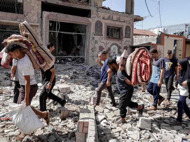 Gazans evacuate following an IDF operation in the Nuseirat camp. Picture: Bashar Taleb/AFP