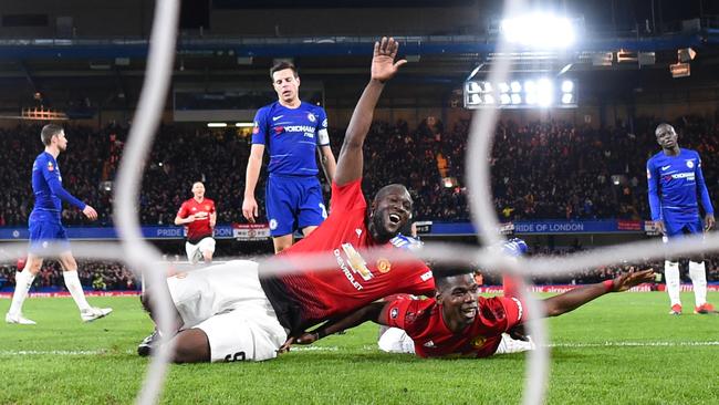 Paul Pogba (right) of Manchester United celebrates with teammate Romelu Lukaku after scoring his team's second goal during the FA Cup fifth round match against Chelsea. Picture: Getty Images
