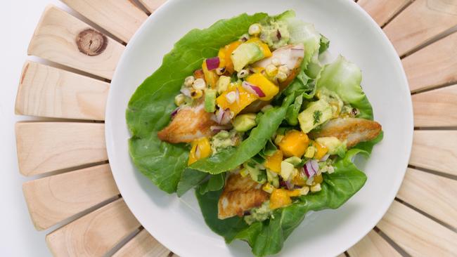 Tropical fish tacos in lettuce cups.