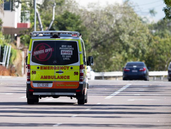 An ambulance is seen leaving the Mash Suites  in Darwin CBD, Tuesday, July 16, 2019. Police and health department staff spent almost 20 hours at the building before he was taken into the care of paramedics. Picture: KERI MEGELUS