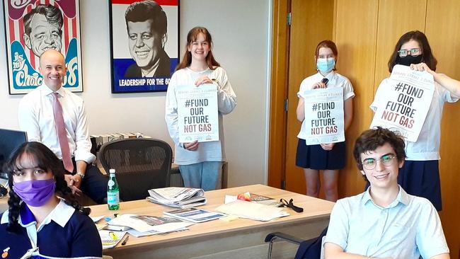 Environment and Energy Minister Matt Kean poses with school strike climate students in his office. Picture: Facebook