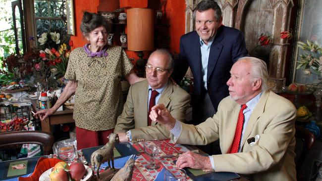 A young Philip Bacon (standing up) with artist Margaret Olley, Tim Storrier and Jeffrey Smart.