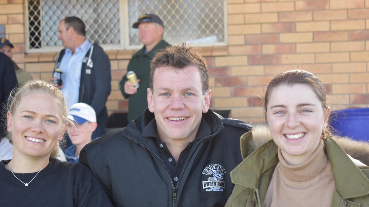 Kirilee Sires with Harry Marshall and Sarah Marshall on the sidelines at the Warwick Water Rats reunion round on July 10, 2021.