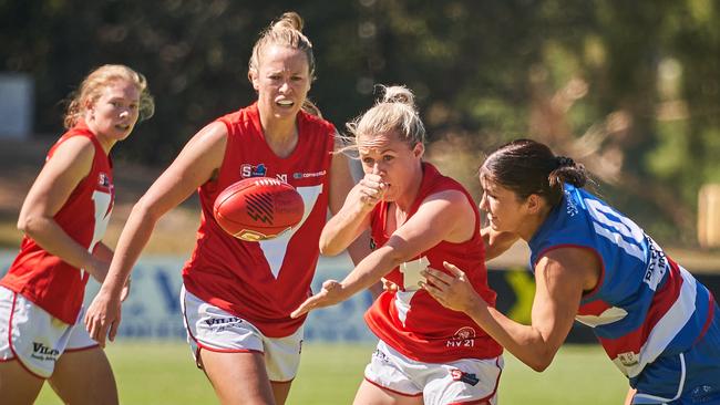 Lauren Daniel getting tackled by Shannon Murphy on Saturday.. Picture: AAP/Matt Loxton