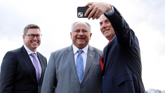 Deputy Prime Minister Richard Marles, United States Secretary of the navy Carlos Del Toro and Pat Conroy, Minister for Defence Industry take a selfie on board HMAS Canberra in Sydney. Picture: NCA NewsWire / Damian Shaw