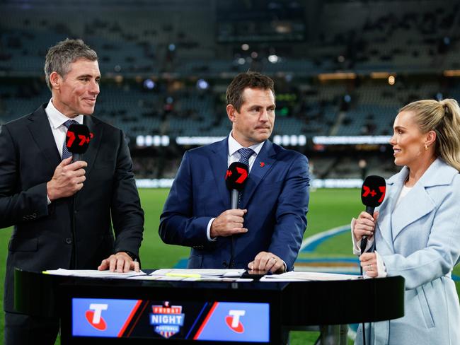 Matthew Richardson, Luke Hodge and Abbey Holmes last season. Picture: Dylan Burns/AFL Photos