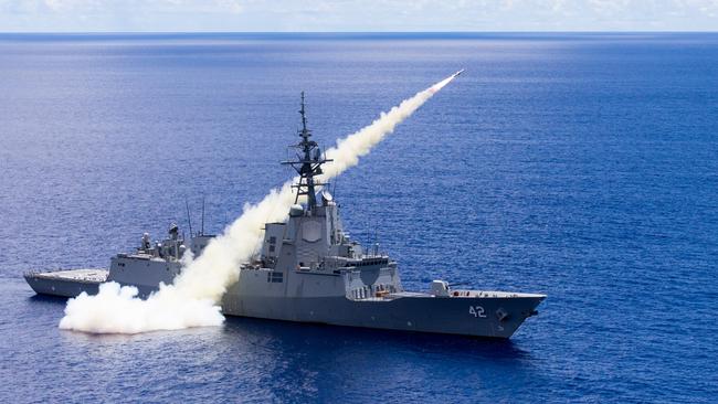 The Royal Australian Navy Hobart Class guided missile destroyer (DDG) HMAS Sydney striking a land target with a Harpoon surface to surface missile, will acquire the Tomahawk. Picture: Defence