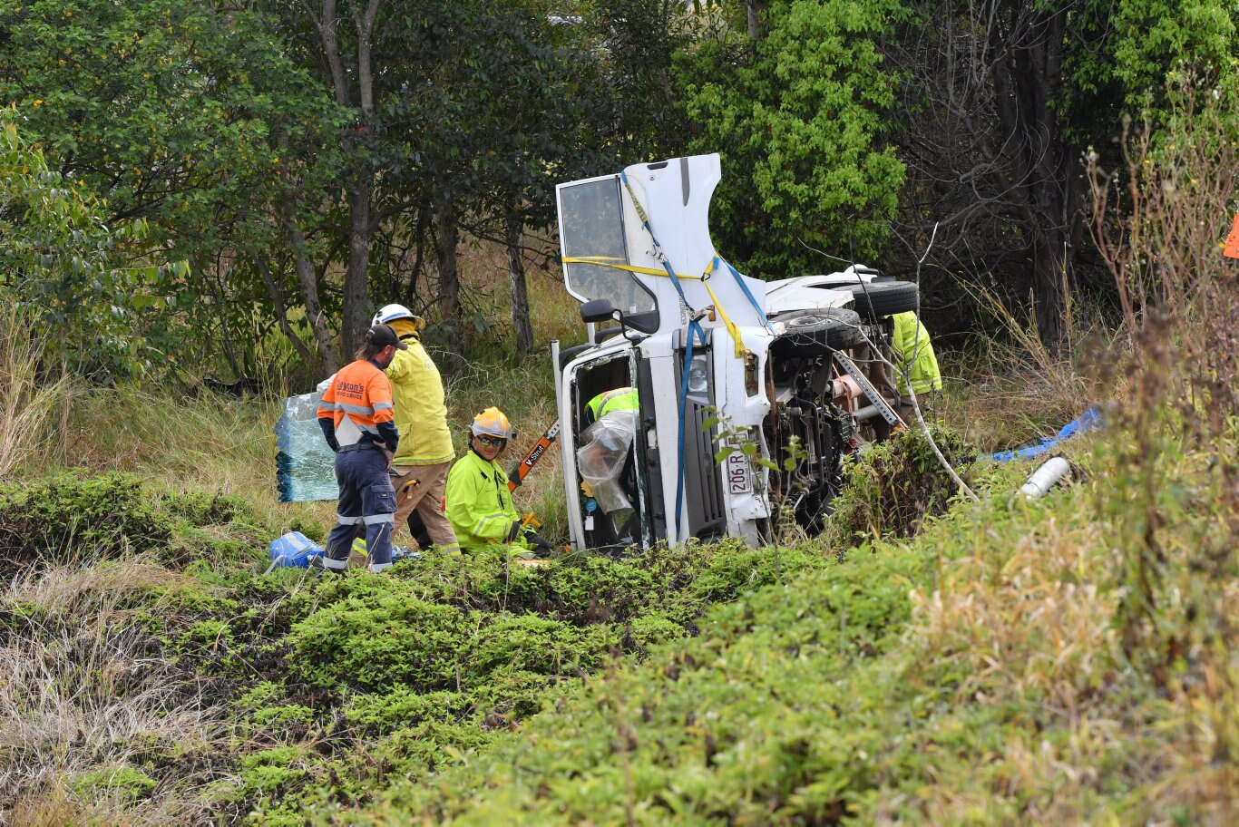 A 70 year old female was trapped inside their vehicle after it rolled on the Coolum-Yandina Road near the Coolum roundabout on the Sunshine Motorway. Photo: John McCutcheon / Sunshine Coast Daily