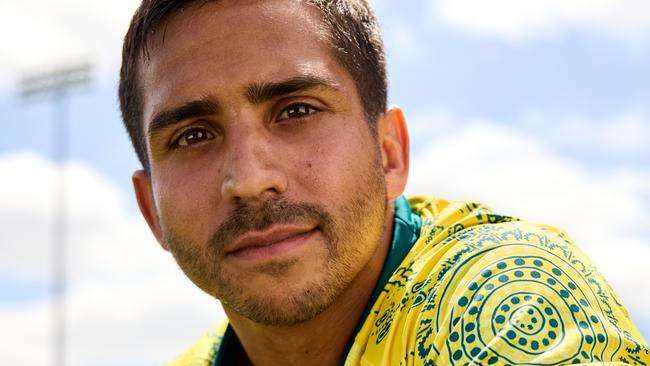 Rugby player Maurice Longbottom models the  Australian Olympic Team delegation and competition uniforms for Paris 2024, at the iconic Yurong Point (Mrs Macquarie’s Chair) in the Botanic Gardens in Sydney.  Picture: Supplied