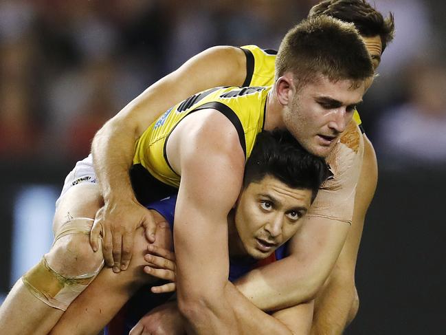 Robin Nahas is saddled by Anthony Miles in the 2017 VFL grand final. Picture: Michael Klein