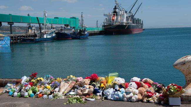 Flowers and children's toys left at the wharf where Damien Little killed his sons and himself. Picture: News Corp.