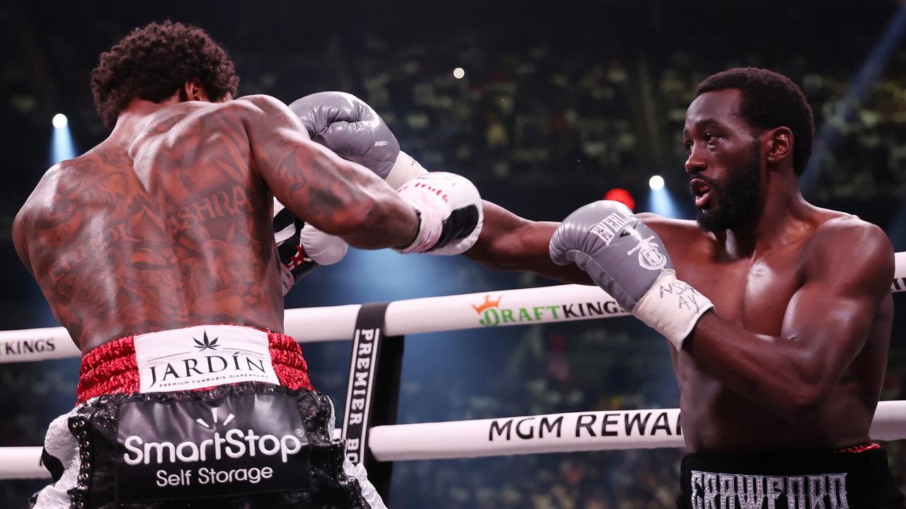 Terrence Crawford punches Errol Spence Jr. Photo by Al Bello/Getty Images.