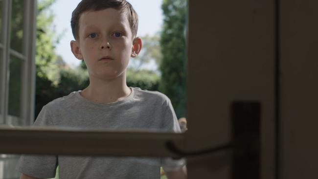 A 10-year-old boy slams the door on a girl in the confronting new ad.