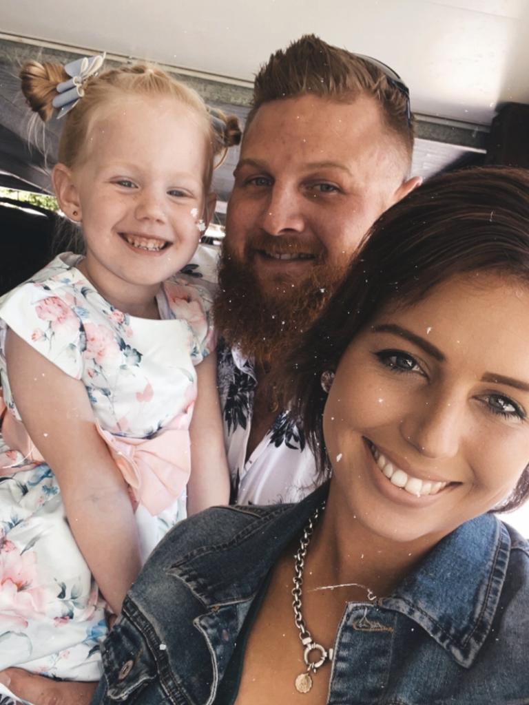 Young mum Mikaela Holzheimer, pictured with her husband Jake and daughter Ariah, has opened up about the shocking and devastating moment she was diagnosed with breast cancer.