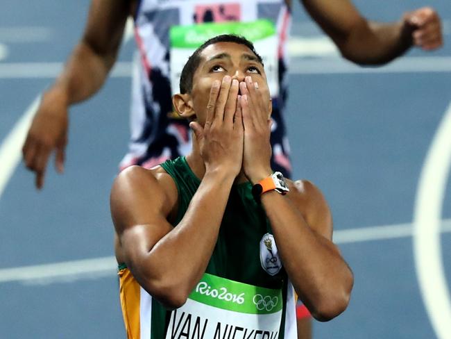 RIO DE JANEIRO, BRAZIL - AUGUST 14: Wayde van Niekerk of South Africa reacts after winning the Men's 400 meter final on Day 9 of the Rio 2016 Olympic Games at the Olympic Stadium on August 14, 2016 in Rio de Janeiro, Brazil. (Photo by Ezra Shaw/Getty Images)