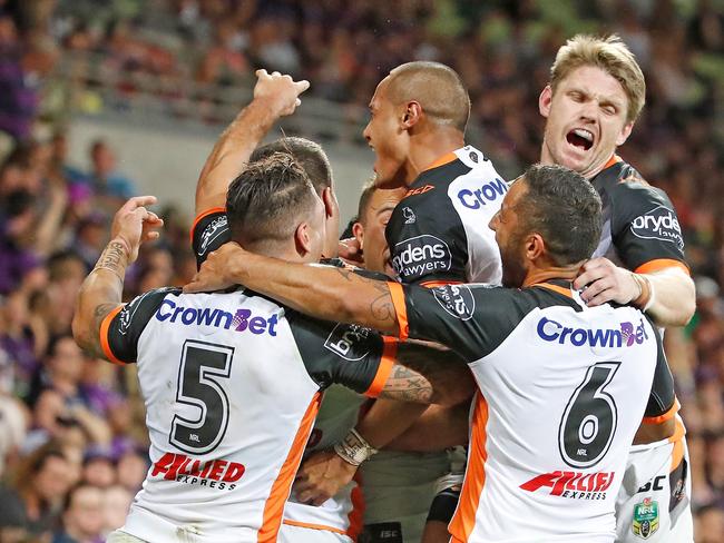 Wests Tigers celebrate their shock win over the Storm. Picture: Getty Images)