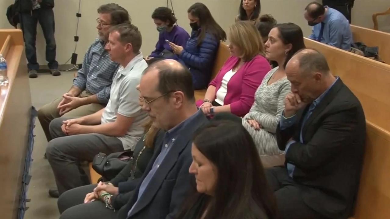 People reacting to the jury’s verdict at Jones’ defamation trial. Picture: Reuters