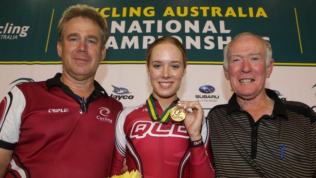 Reggie Tucker with son Kenrick and granddaughter Brooke after one of her gold-medal winning rides at the national championships.