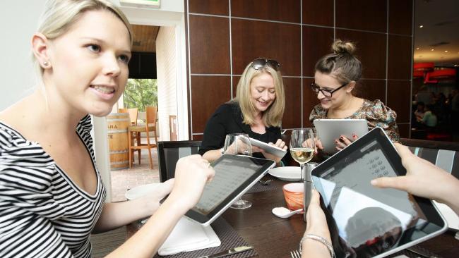 Florence Sandford, Renate Ruge, Margarita Peker and Lisa Perkovic (left to right) order on the iPad menu. Picture: Ross Schultz