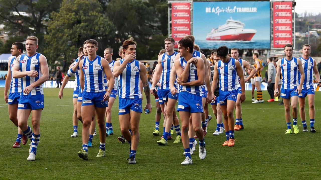 North Melbourne leave the field after a loss to the Hawthorn Hawks at Blundstone Arena. Picture: Dylan Burns