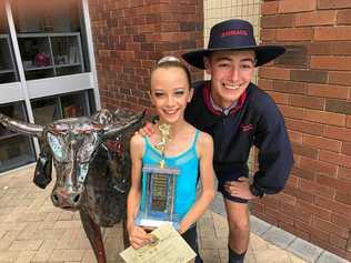 Sienna Westcott wins the Tap Improvisation U10 trophy her brother Mitchell won in 2012. Picture: Jann Houley