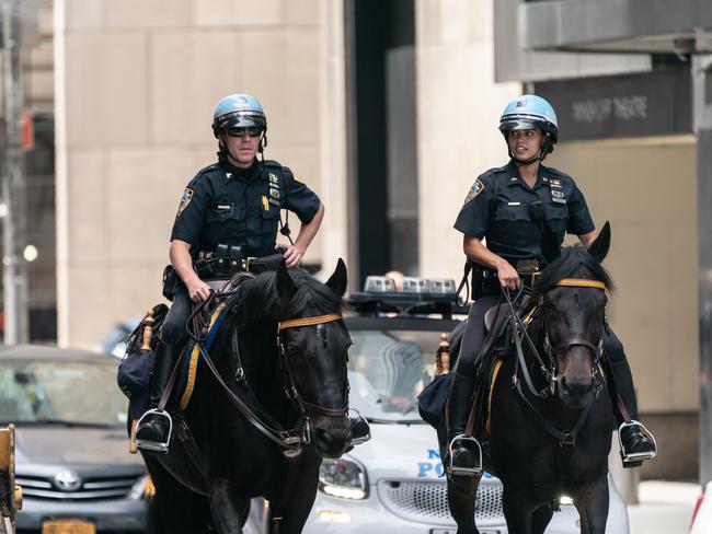 Officers of the New York City Police Mounted United patrol in Times Square. Picture: AFP