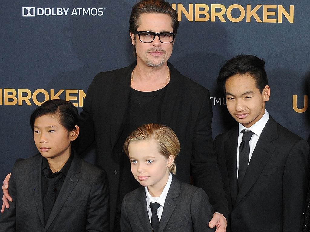 Brad Pitt with kids Maddox Jolie-Pitt, Shiloh Jolie-Pitt, and Pax Jolie-Pitt. Picture: Gregg DeGuire/WireImage