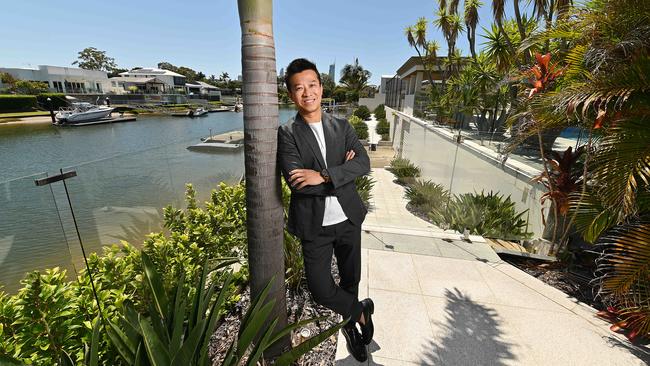 Ray White agent Sam Guo at a property he is selling for over $4 million in Sorrento on the Gold Coast. Picture: Lyndon Mechielsen