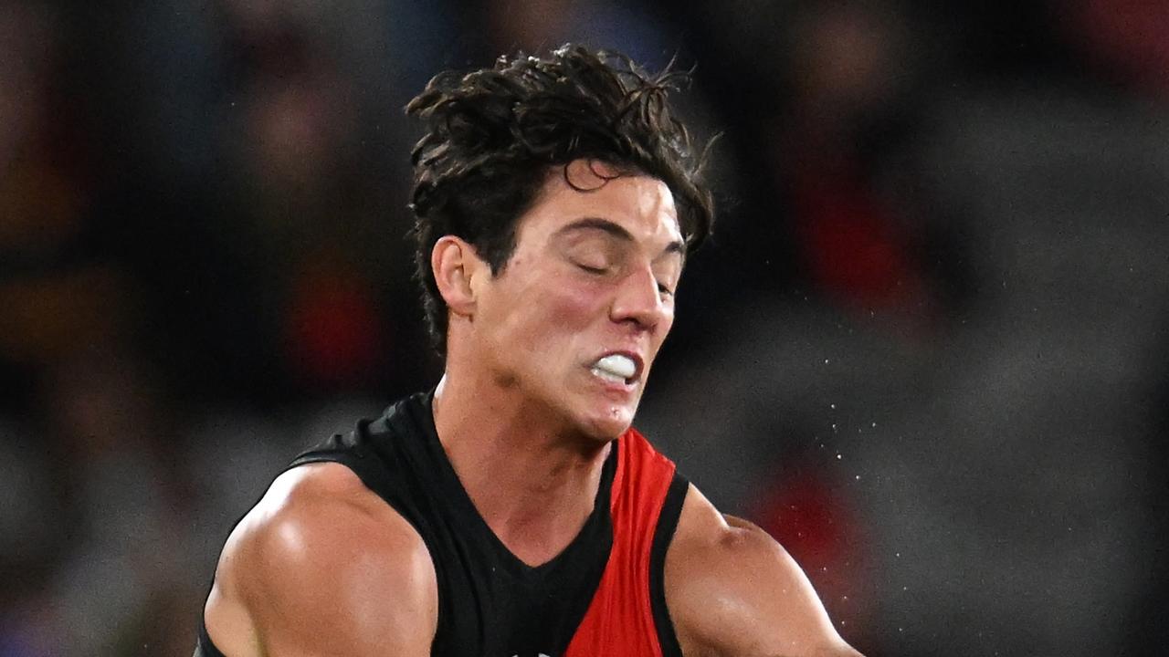 Essendon midfielder Jye Caldwell was cleared of concussion but unable to continue playing because he was subbed out when his collision happened late in the game. Picture: Daniel Pockett / Getty Images