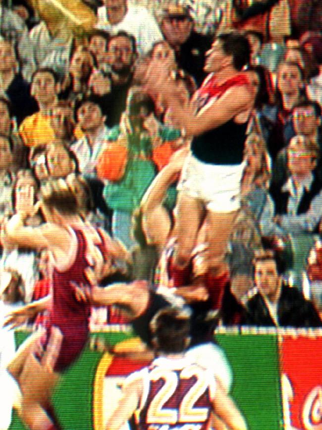 Shaun Smith stands on Garry Lyon’s head.