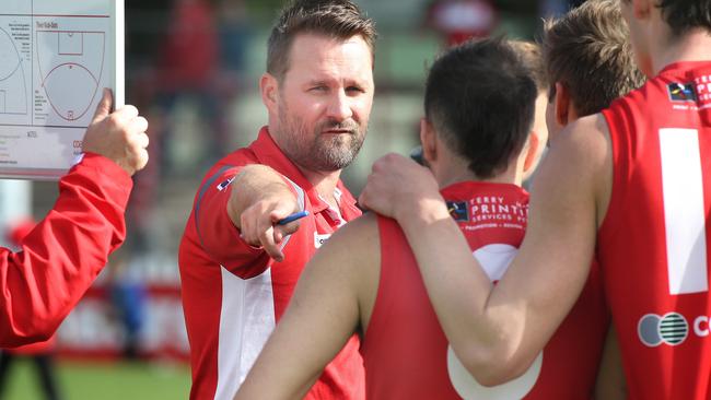 North Adelaide coach Jacob Surjan addresses his charges. Picture: Dean Martin.