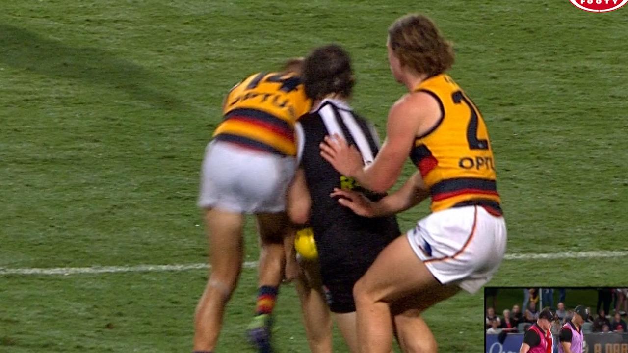 Hunter Clark broke his jaw after this infamous collision with Adelaide’s David Mackay. Picture: Fox Sports