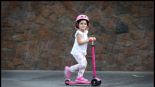 Ava Pearce loves riding on her pink scooter. Picture: Jamie Hanson