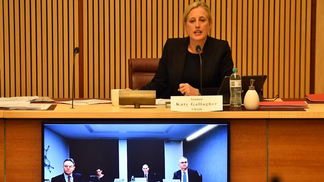 Labor finance spokesman Katy Gallagher questions APRA chair Wayne Byres, second right, on video link at the Senate inquiry into COVID-19 on Thursday. Picture: AAP