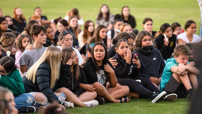 Heartbroken friends of Sienna at the memorial. Picture: Jason Edwards