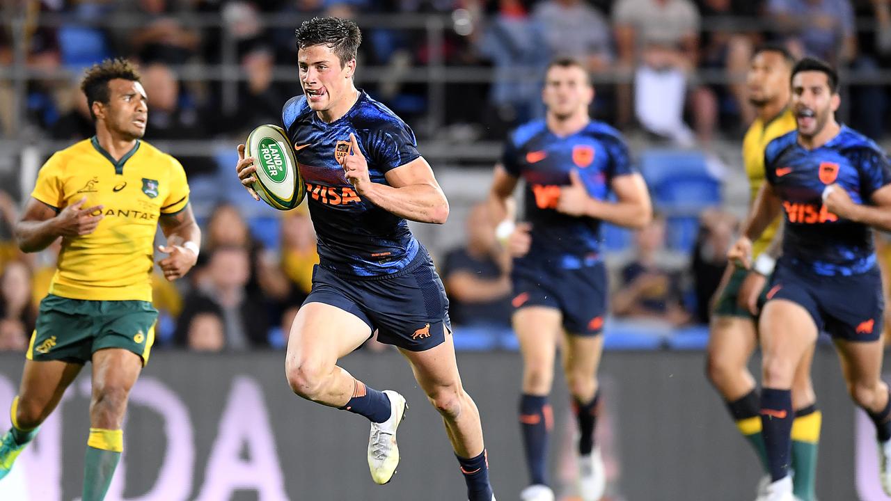 Bautista Delguy of the Pumas breaks through on his way to scoring a try.