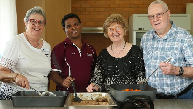 Fr Daniel (second from left) with soup kitchen volunteers Margaret Coombs, Fay Nolan and Allan Bertling at All Saints Anglican Church Chermside. Picture: AAP/Jono Searle