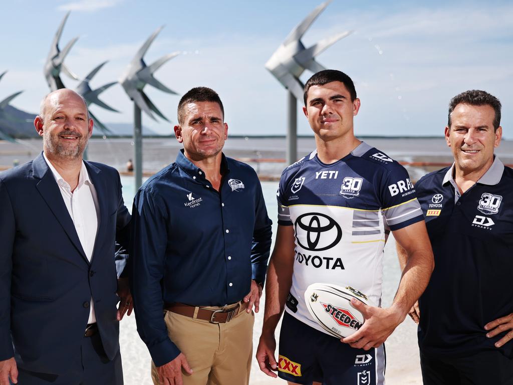 North Queensland Cowboys chief executive Jeff Reibel, former Cowboys player Joel Riethmuller, current player Jake Clifford and 1995 season player Dean Schifilliti launch their 30 year jersey at the Cairns Esplanade lagoon. Picture: Brendan Radke