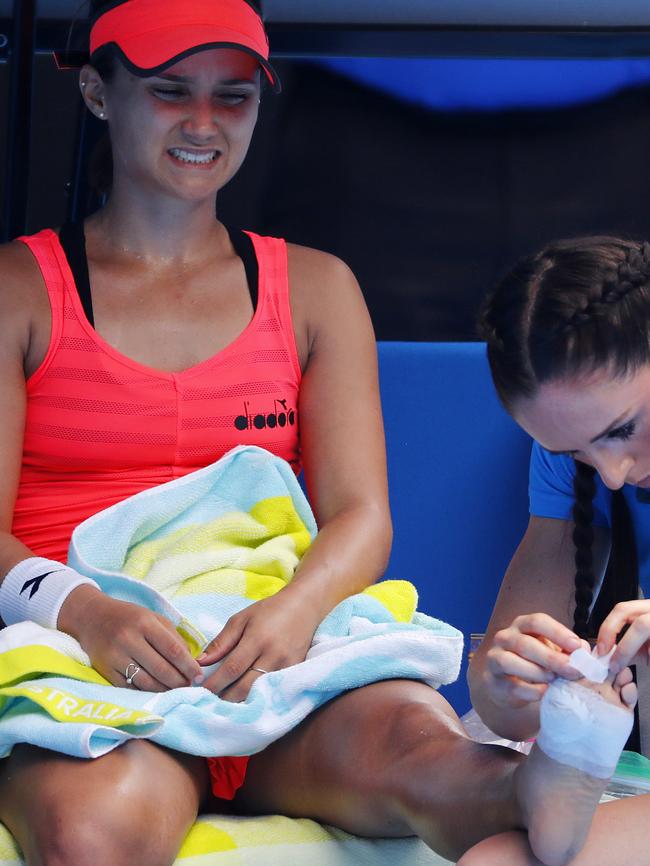 Lauren Davis gets treatment to her injured left foot during her second medical time out.