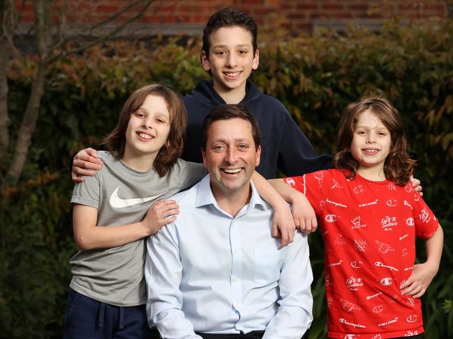 Leader of Victorian Liberal Party Matthew Guy and sons  Sam 10, Joey 12, and Alex 8 at home.                      Picture: David Caird