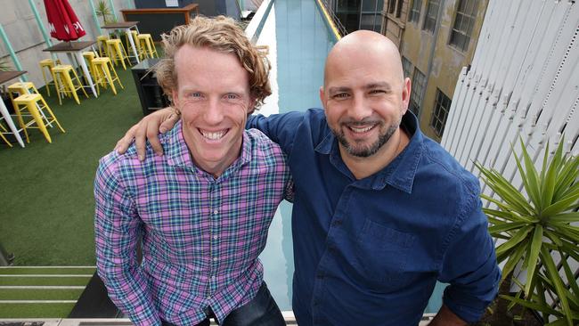 Steve Hooper and Ozzie Kheir on the roof at Ozzie's hotel, the Adelphi. Picture: Andrew Tauber