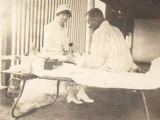 Nurse with a patient at the Halls Creek nursing home, Western Australia. Picture: John Flynn