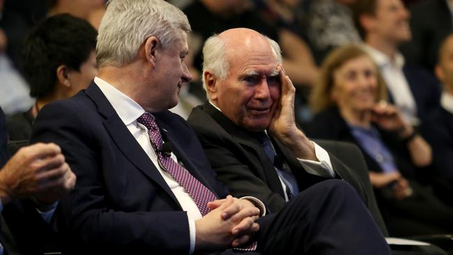 Stephen Harper, left, and former Australian PM John Howard found common ground. Picture: Hollie Adams/The Australian